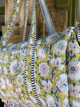 Load image into Gallery viewer, Block-printed and quilted overnight bag.
