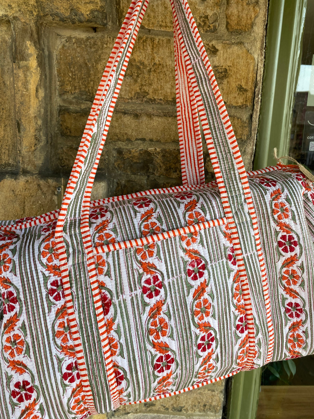 Block-printed and quilted overnight bag.